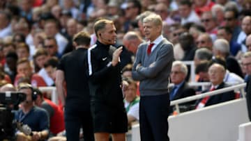 LONDON, ENGLAND - APRIL 22: Arsene Wenger, Manager of Arsenal speaks with the fourth official during the Premier League match between Arsenal and West Ham United at Emirates Stadium on April 22, 2018 in London, England. (Photo by Shaun Botterill/Getty Images)