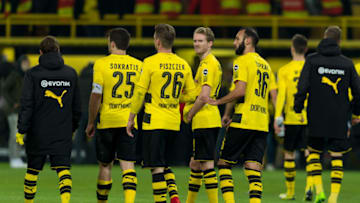 DORTMUND, GERMANY - JANUARY 14:Sokratis of Dortmund , Lukasz Piszczek of Dortmund , Andre Schuerrle of Dortmund and Oemer Toprak of Dortmund look on after the Bundesliga match between Borussia Dortmund and VfL Wolfsburg at Signal Iduna Park on January 14, 2018 in Dortmund, Germany. (Photo by TF-Images/TF-Images via Getty Images)