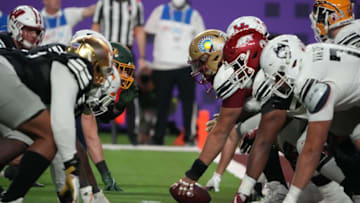 A general overall view of the line of scrimmage as East lineman Jack Snyder of San Jose State (55) snaps the ball against the West in the first half of the East-West Shrine Bowl Mandatory Credit: Kirby Lee-USA TODAY Sports