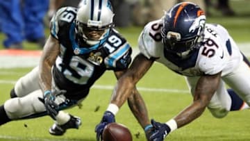 Feb 7, 2016; Santa Clara, CA, USA; Denver Broncos inside linebacker Danny Trevathan (59) recovers a fumble against Carolina Panthers wide receiver Ted Ginn (19) during the third quarter in Super Bowl 50 at Levi