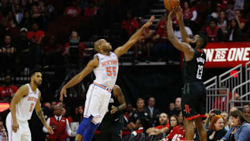 HOUSTON, TX - NOVEMBER 25: James Harden #13 of the Houston Rockets shoots over Jarrett Jack #55 of the New York Knicks at Toyota Center on November 25, 2017 in Houston, Texas. (Photo by Bob Levey/Getty Images)