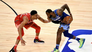 CHICAGO, ILLINOIS - FEBRUARY 16: LeBron James #2 of Team LeBron handles the ball while being guarded by Giannis Antetokounmpo #24 of Team Giannis in the fourth quarter during the 69th NBA All-Star Game at the United Center on February 16, 2020 in Chicago, Illinois. NOTE TO USER: User expressly acknowledges and agrees that, by downloading and or using this photograph, User is consenting to the terms and conditions of the Getty Images License Agreement. (Photo by Stacy Revere/Getty Images)