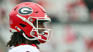 Georgia Bulldogs running back James Cook (4) works out prior to the game at TIAA Bank Field. Mandatory Credit: Kim Klement-USA TODAY Sports