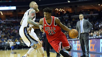 Apr 5, 2016; Memphis, TN, USA; Chicago Bulls guard Jimmy Butler (21) drives against Memphis Grizzlies center Chris Andersen (7) at FedExForum. Mandatory Credit: Nelson Chenault-USA TODAY Sports