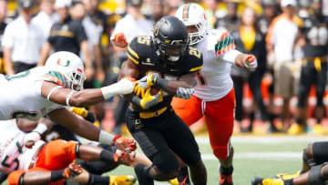 Sep 17, 2016; Boone, NC, USA; Appalachian State Mountaineers running back Jalin Moore (25) runs the ball during the first quarter against the Miami Hurricanes at Kidd Brewer Stadium. Mandatory Credit: Jeremy Brevard-USA TODAY Sports