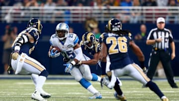 ST. LOUIS, MO - DECEMBER 13: Theo Riddick #25 of the Detroit Lions is tackled by Lamarcus Joyner #20 of the St. Louis Rams in the second quarter at the Edward Jones Dome on December 13, 2015 in St. Louis, Missouri. (Photo by Dilip Vishwanat/Getty Images)