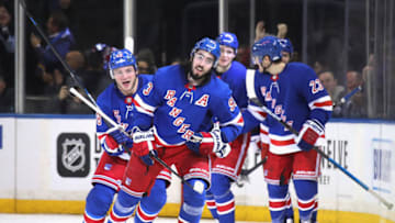 NEW YORK, NEW YORK - MARCH 05: Mika Zibanejad #93 of the New York Rangers celebrates his hattrick goal at 12 seconds of the third period against the Washington Capitals at Madison Square Garden on March 05, 2020 in New York City. The Rangers defeated the Capitals 5-4 in overtime. (Photo by Bruce Bennett/Getty Images)