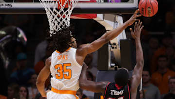 KNOXVILLE, TN - NOVEMBER 9: Yves Pons #35 of the Tennessee Volunteers blocks the shot of Marcus Stroman #35 of the Louisiana Lafayette Ragin Cajuns during the first half of the game between the Louisiana-Lafayette Ragin' Cajuns and the Tennessee Volunteers at Thompson-Boling Arena on November 9, 2018 in Knoxville, Tennessee. (Photo by Donald Page/Getty Images)