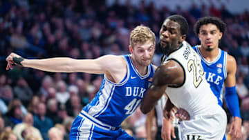 WINSTON-SALEM, NORTH CAROLINA - FEBRUARY 25: Jack White #41 of the Duke Blue Devils guards Chaundee Brown #23 of the Wake Forest Demon Deacons during the first half during their game at LJVM Coliseum Complex on February 25, 2020 in Winston-Salem, North Carolina. (Photo by Jacob Kupferman/Getty Images)