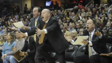 Dec 14, 2012; Cleveland, OH, USA; Milwaukee Bucks head coach Scott Skiles (center) reacts with assistant coaches Jim Boylan (left) and Joe Wolf in the second quarter against the Cleveland Cavaliers at Quicken Loans Arena. Mandatory Credit: David Richard-USA TODAY Sports