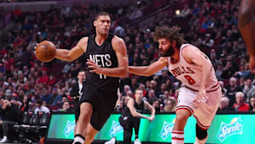 Dec 28, 2016; Chicago, IL, USA; Brooklyn Nets center Brook Lopez (11) dribbles the ball against Chicago Bulls center Robin Lopez (8) during the first half at the United Center. Mandatory Credit: Mike DiNovo-USA TODAY Sports