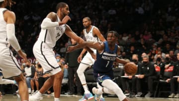 Minnesota Timberwolves forward Anthony Edwards drives around Brooklyn Nets forward LaMarcus Aldridge. Mandatory Credit: Brad Penner-USA TODAY Sports