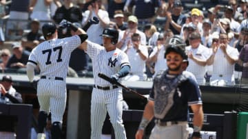 NEW YORK, NEW YORK - MAY 27: Clint Frazier #77 of the New York Yankees celebrates his second inning home run with Gio Urshela #29 during their game against the San Diego Padres at Yankee Stadium on May 27, 2019 in New York City. (Photo by Al Bello/Getty Images)