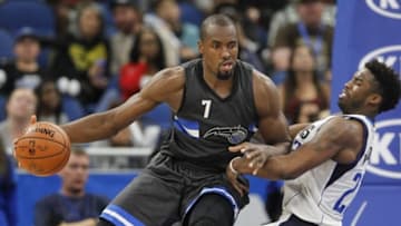 Nov 19, 2016; Orlando, FL, USA; Orlando Magic forward Serge Ibaka (7) drives into and fouls Dallas Mavericks guard Wesley Matthews (23) during the second half of an NBA basketball game at Amway Center. The Magic won 95-87. Mandatory Credit: Reinhold Matay-USA TODAY Sports