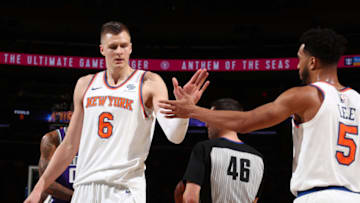NEW YORK, NY - NOVEMBER 11: Kristaps Porzingis #6 of the New York Knicks high fives teammate Courtney Lee #5 of the New York Knicks during the game against the Sacramento Kings on November 11, 2017 at Madison Square Garden in New York City, New York. Copyright 2017 NBAE (Photo by Nathaniel S. Butler/NBAE via Getty Images)
