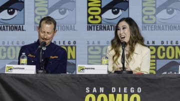 SAN DIEGO, CALIFORNIA - JULY 22: (L-R) Scott M. Gimple and Angela Kang speak onstage at AMC's "The Walking Dead" panel during 2022 Comic-Con International: San Diego at San Diego Convention Center on July 22, 2022 in San Diego, California. (Photo by Kevin Winter/Getty Images)