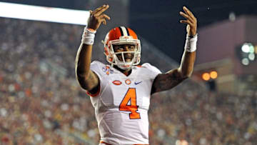 Oct 29, 2016; Tallahassee, FL, USA; Clemson Tigers quarterback Deshaun Watson (4) makes a signal to the crowd after a touchdown during the game against the Florida State Seminoles at Doak Campbell Stadium. Mandatory Credit: Melina Vastola-USA TODAY Sports