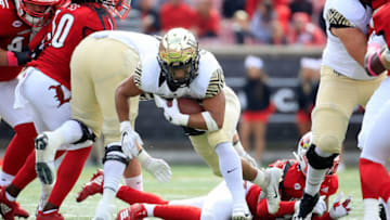 LOUISVILLE, KY - OCTOBER 27: Matt Coburn II #22 of the Wake Forest Demon Deacons runs with the ball against the Louisville Cardinals on October 27, 2018 in Louisville, Kentucky. (Photo by Andy Lyons/Getty Images)