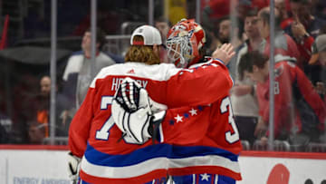 WASHINGTON, DC - DECEMBER 27: Capitals goalie Braden Holtby (70) hugs goalie Ilya Samsonov (30) after overtime of the Columbus Blue Jackets vs. Washington Capitals on December 27, 2019 at Capital One Arena in Washington, D.C.. (Photo by Randy Litzinger/Icon Sportswire via Getty Images)