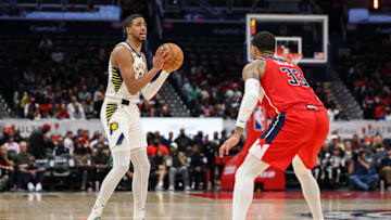 WASHINGTON, DC - OCTOBER 28: Tyrese Haliburton #0 of the Indiana Pacers handles the ball as Kyle Kuzma #33 of the Washington Wizards defends during the first half at Capital One Arena on October 28, 2022 in Washington, DC. NOTE TO USER: User expressly acknowledges and agrees that, by downloading and or using this photograph, User is consenting to the terms and conditions of the Getty Images License Agreement. (Photo by Scott Taetsch/Getty Images)