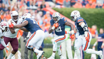 AUBURN, AL - NOVEMBER 18: Running back Kerryon Johnson #21 of the Auburn Tigers runs the ball through traffic during their game against the Louisiana Monroe Warhawks at Jordan-Hare Stadium on November 18, 2017 in Auburn, Alabama. (Photo by Michael Chang/Getty Images)