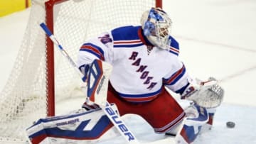 Mar 31, 2015; Winnipeg, Manitoba, CAN; New York Rangers goalie Henrik Lundqvist (30) makes a save during the first period against the Winnipeg Jets at MTS Centre. Mandatory Credit: Bruce Fedyck-USA TODAY Sports