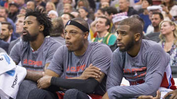 Dec 26, 2015; Salt Lake City, UT, USA; Los Angeles Clippers center DeAndre Jordan (6), forward Paul Pierce (34), and guard Chris Paul (3) watch from the bench during the second half against the Utah Jazz at Vivint Smart Home Arena. The Clippers won 109-104. Mandatory Credit: Rob Gray-USA TODAY Sports