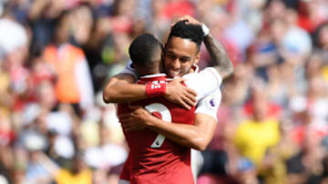 LONDON, ENGLAND - APRIL 22: Alexandre Lacazette of Arsenal celebrates scoring his side's third goal with Pierre-Emerick Aubameyang during the Premier League match between Arsenal and West Ham United at Emirates Stadium on April 22, 2018 in London, England. (Photo by Shaun Botterill/Getty Images)