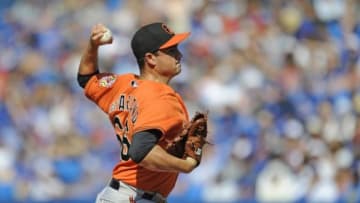 Sep 5, 2015; Toronto, Ontario, CAN; Baltimore Orioles relief pitcher T.J. McFarland (66) pitches against Toronto Blue Jays in the eighth inning at Rogers Centre. Jays beat Orioles 5 - 1. Mandatory Credit: Peter Llewellyn-USA TODAY Sports