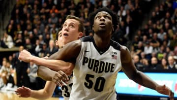 Jan 7, 2016; West Lafayette, IN, USA; Purdue Boilermakers forward Caleb Swanigan (50) and Michigan Wolverines guard Duncan Robinson (22) wait for a rebound in the second half at Mackey Arena. Purdue won the game 87-70. Mandatory Credit: Sandra Dukes-USA TODAY Sports