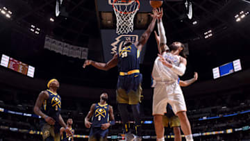 DENVER, CO - FEBRUARY 1: Kenneth Faried #35 of the Denver Nuggets and Steven Adams #12 of the Oklahoma City Thunder jump for the rebound on February 1, 2018 at the Pepsi Center in Denver, Colorado. NOTE TO USER: User expressly acknowledges and agrees that, by downloading and/or using this Photograph, user is consenting to the terms and conditions of the Getty Images License Agreement. Mandatory Copyright Notice: Copyright 2018 NBAE (Photo by Garrett Ellwood/NBAE via Getty Images)