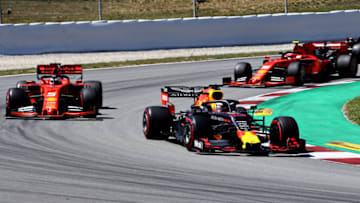 BARCELONA, SPAIN - MAY 12: Max Verstappen of the Netherlands driving the (33) Aston Martin Red Bull Racing RB15 leads Sebastian Vettel of Germany driving the (5) Scuderia Ferrari SF90 on track during the F1 Grand Prix of Spain at Circuit de Barcelona-Catalunya on May 12, 2019 in Barcelona, Spain. (Photo by Mark Thompson/Getty Images)