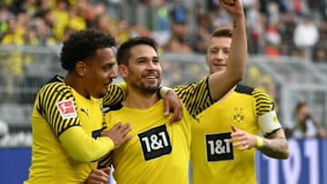 Raphael Guerreiro celebrates scoring the opening goal (Photo by INA FASSBENDER/AFP via Getty Images)