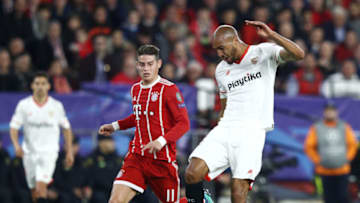 SEVILLE, SPAIN - APRIL 03: Steven N'Zonzi of Sevilla shoots while under pressure from James Rodriguez of Bayern Muenchen during the UEFA Champions League Quarter Final Leg One match between Sevilla FC and Bayern Muenchen at Estadio Ramon Sanchez Pizjuan on April 3, 2018 in Seville, Spain. (Photo by Adam Pretty/Getty Images)