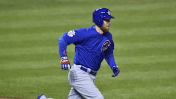 Oct 26, 2016; Cleveland, OH, USA; Chicago Cubs outfielder Ben Zobrist hits a RBI triple against the Cleveland Indians in the fifth inning in game two of the 2016 World Series at Progressive Field. Mandatory Credit: David Richard-USA TODAY Sports