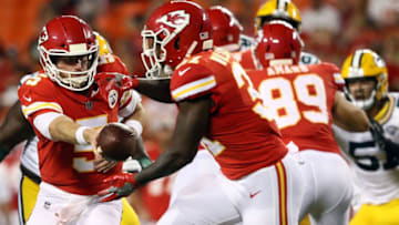 KANSAS CITY, MO - AUGUST 30: Quarterback Matt McGloin #5 of the Kansas City Chiefs hands off to running back Darrel Williams #31 during the preseason game against the Green Bay Packers at Arrowhead Stadium on August 30, 2018 in Kansas City, Missouri. (Photo by Jamie Squire/Getty Images)