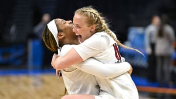 SEATTLE, WASHINGTON - MARCH 24: Merissah Russell #13 and Hailey Van Lith #10 of the Louisville Cardinals celebrate after defeating the Ole Miss Rebels in the Sweet 16 round of the NCAA Women's Basketball Tournament at Climate Pledge Arena on March 24, 2023 in Seattle, Washington. (Photo by Alika Jenner/Getty Images)
