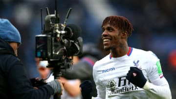 LEICESTER, ENGLAND - DECEMBER 16: Wilfried Zaha of Crystal Palace celebrates victory after the Premier League match between Leicester City and Crystal Palace at The King Power Stadium on December 16, 2017 in Leicester, England. (Photo by Jan Kruger/Getty Images)
