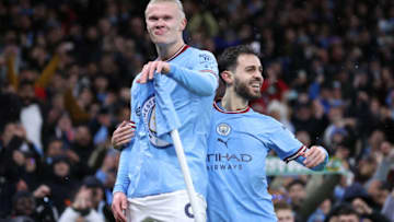MANCHESTER, ENGLAND - MARCH 14: Erling Haaland of Manchester City celebrates with Bernardo Silva after scoring their second goal during the UEFA Champions League round of 16 leg two match between Manchester City and RB Leipzig at Etihad Stadium on March 14, 2023 in Manchester, England. (Photo by Alex Livesey - Danehouse/Getty Images)