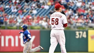 Jun 15, 2016; Philadelphia, PA, USA; Philadelphia Phillies starting pitcher Jeremy Hellickson (58) reacts after allowing a home run by Toronto Blue Jays designated hitter Edwin Encarnacion (10) during the second inning at Citizens Bank Park. Mandatory Credit: Eric Hartline-USA TODAY Sports