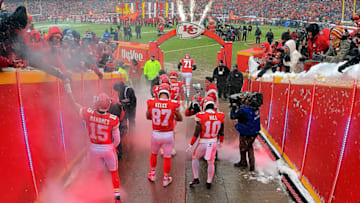 KANSAS CITY, MISSOURI - JANUARY 12: Patrick Mahomes #15, Travis Kelce #87, and Tyreek Hill #10 of the Kansas City Chiefs exit the tunnel onto the field during player introductions prior to the AFC Divisional round playoff game against the Indianapolis Colts at Arrowhead Stadium on January 12, 2019 in Kansas City, Missouri. (Photo by Jamie Squire/Getty Images)