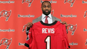 Apr 22, 2013; Tampa, FL, USA; Tampa Bay Buccaneers cornerback Darrelle Revis holds up a jersey as he is introduced at the press conference at One Buccaneer Place. Mandatory Credit: Kim Klement-USA TODAY Sports