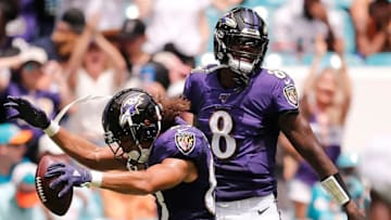 MIAMI, FLORIDA - SEPTEMBER 08: Willie Snead #83 of the Baltimore Ravens celebrates with Lamar Jackson #8 after scoring a touchdown against the Miami Dolphins during the second quarter at Hard Rock Stadium on September 08, 2019 in Miami, Florida. (Photo by Michael Reaves/Getty Images)