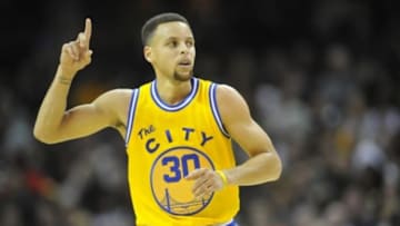 Jan 18, 2016; Cleveland, OH, USA; Golden State Warriors guard Stephen Curry (30) celebrates a three-point basket in the third quarter against the Cleveland Cavaliers at Quicken Loans Arena. Mandatory Credit: David Richard-USA TODAY Sports