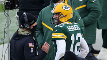 GREEN BAY, WISCONSIN - NOVEMBER 15: Head coach Matt LaFleur and Aaron Rodgers #12 of the Green Bay Packers celebrate after scoring a touchdown in the second quarter against the Jacksonville Jaguars at Lambeau Field on November 15, 2020 in Green Bay, Wisconsin. (Photo by Dylan Buell/Getty Images)