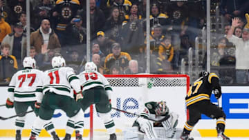 BOSTON, MA - NOVEMBER 23: Torey Krug #47 of the Boston Bruins scores in overtime against the Minnesota Wild at the TD Garden on November 23, 2019 in Boston, Massachusetts. (Photo by Brian Babineau/NHLI via Getty Images)