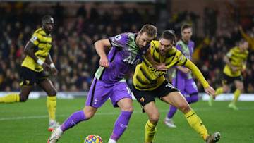 WATFORD, ENGLAND - JANUARY 01: Harry Kane of Tottenham Hotspur is challenged by Francisco Sierralta of Watford FC during the Premier League match between Watford and Tottenham Hotspur at Vicarage Road on January 01, 2022 in Watford, England. (Photo by Justin Setterfield/Getty Images)
