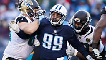 NASHVILLE, TN - DECEMBER 31: Jurrell Casey #99 of the Tennessee Titans is blocked by Brandon Linder #65 of the Jacksonville Jaguars at Nissan Stadium on December 31, 2017 in Nashville, Tennessee. The Titans defeated the Jaguars 15-10. (Photo by Wesley Hitt/Getty Images)