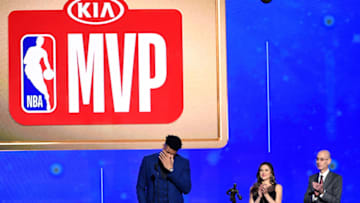 SANTA MONICA, CALIFORNIA - JUNE 24: (L-R) Giannis Antetokounmpo accepts the Kia NBA Most Valuable Player award from NBA Commissioner Adam Silver onstage during the 2019 NBA Awards presented by Kia on TNT at Barker Hangar on June 24, 2019 in Santa Monica, California. (Photo by Kevin Winter/Getty Images for Turner Sports)