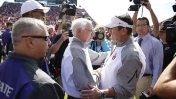 Oct 18, 2014; Norman, OK, USA; Oklahoma Sooners head coach Bob Stoops greets Kansas State Wildcats head coach Bill Snyder after the game at Gaylord Family - Oklahoma Memorial Stadium. Mandatory Credit: Kevin Jairaj-USA TODAY Sports